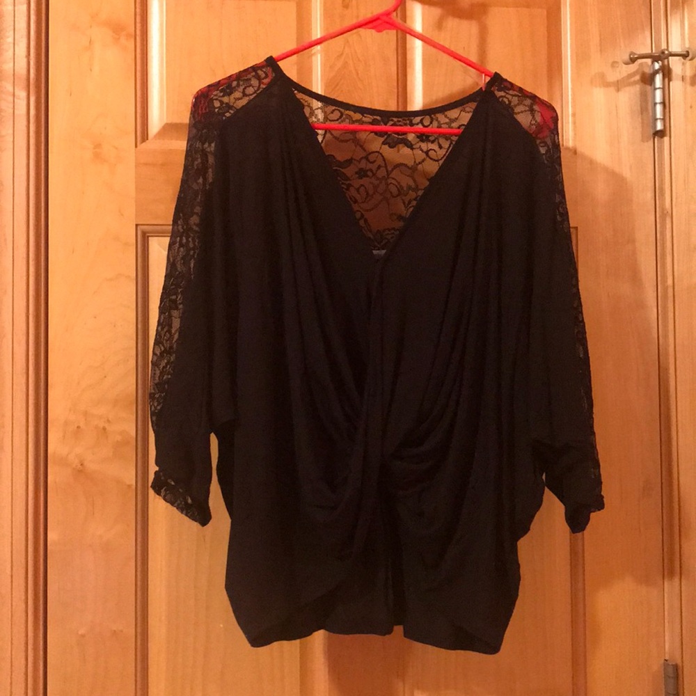 Soft lightweight black top with lace backing